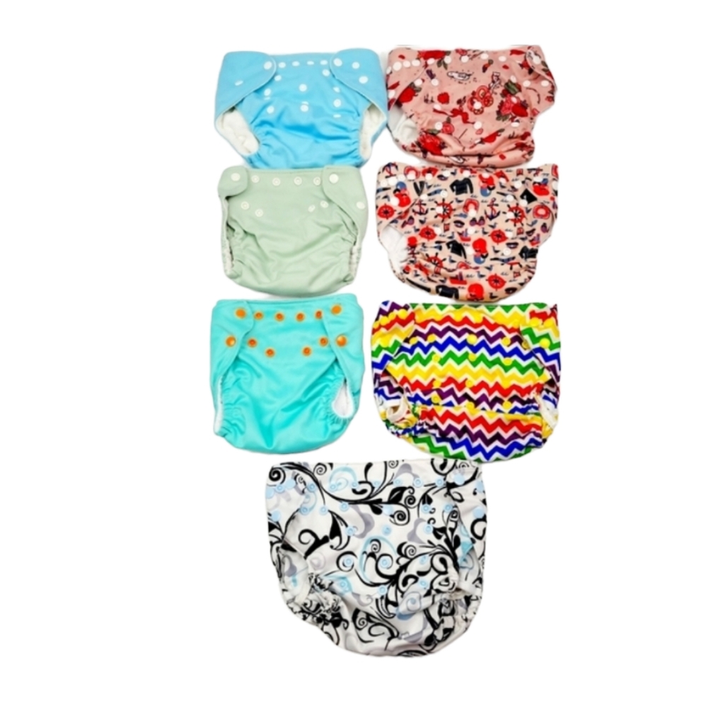Seven Various Sized and Brands of Multi Colored Diaper Covers